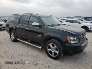 2012 Chevrolet Suburban LT with VIN 1GNSCJE01CR325049, listed as a Copart auction lot 56212525 with 264,000 mi miles and Clean title. Bid and sale history available at DreamBid. Image 4.