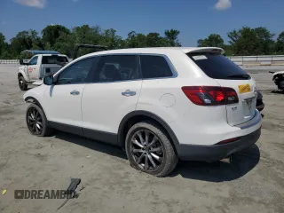 2015 Mazda CX-9 Grand Touring z VIN JM3TB2DA3F0452160, wystawiony jako Copart lot #60220655 z przebiegiem 145 185 mil mil oraz Szkoda całkowita • Salvage title. Historia ofert i sprzedaży dostępna na DreamBid. Obrazek 2.