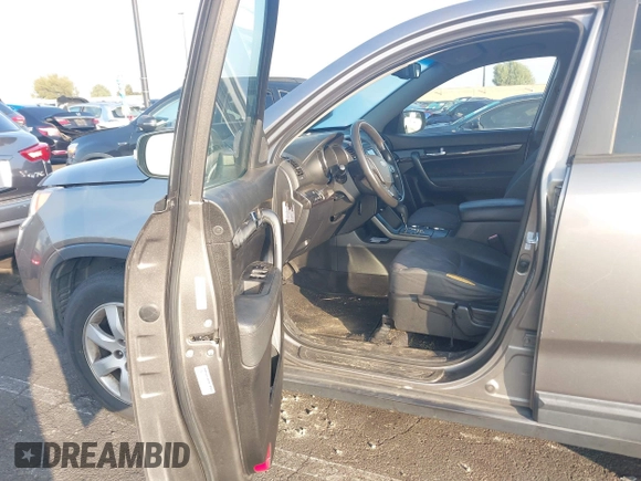 2013 Kia Sorento LX with VIN 5XYKT4A28DG394676, listed as a IAAI auction lot 41409435 with 167,003 mi miles. Bid and sale history available at carsss.com. Image 5.