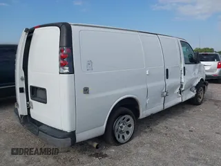 2014 Chevrolet Express Cargo Van with VIN 1GCSGAFX2E1121841, listed as a IAAI auction lot 42028712 with 164,768 mi miles. Bid and sale history available at carsss.com. Image 4.