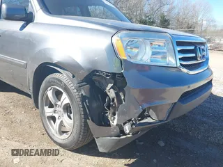 2013 Honda Pilot EX-L with VIN 5FNYF3H79DB037477, listed as a IAAI auction lot 41649734 with 161,902 mi miles and . Bid and sale history available at DreamBid. Image 6.