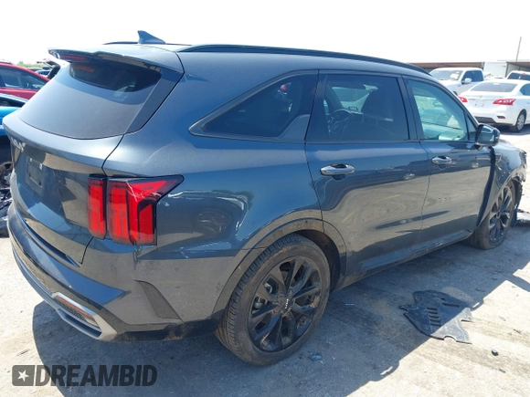 2023 Kia Sorento SX z VIN 5XYRK4LF3PG242259, wystawiony jako IAAI lot #41970398 z przebiegiem 31 293 mil mil oraz . Historia ofert i sprzedaży dostępna na DreamBid. Obrazek 4.