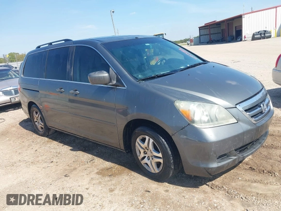 2007 Honda Odyssey EX-L with VIN 5FNRL38767B452922, listed as a IAAI auction lot 41917482 with 282,542 mi miles and . Bid and sale history available at DreamBid. Image 1.