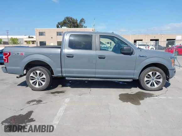 2019 Ford F-150 XL with VIN 1FTEW1EP6KKC99243, listed as a IAAI auction lot 42057955 with 99,666 mi miles. Bid and sale history available at carsss.com. Image 14.