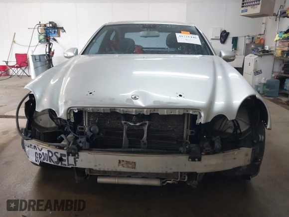 2007 Mercedes-Benz E-Class 3.5L with VIN WDBUF87X77B167115, listed as a IAAI auction lot 41721446 with 184,721 mi miles. Bid and sale history available at carsss.com. Image 13.