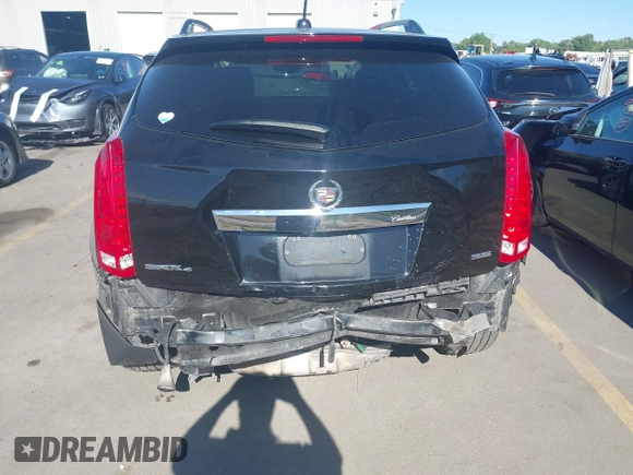 2015 Cadillac SRX Premium Collection with VIN 3GYFNGE3XFS554620, listed as a IAAI auction lot 42308670 with 95,063 mi miles and . Bid and sale history available at DreamBid. Image 6.