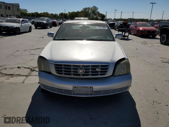 2003 Cadillac DeVille DHS z VIN 1G6KE54Y13U124690, wystawiony jako Copart lot #73757984 z przebiegiem 101 286 mil mil oraz Szkoda całkowita • Salvage title. Historia ofert i sprzedaży dostępna na DreamBid. Obrazek 5.