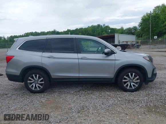 2021 Honda Pilot EX-L with VIN 5FNYF6H50MB063465, listed as a IAAI auction lot 42160636 with 28,595 mi miles and . Bid and sale history available at DreamBid. Image 13.