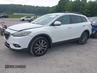 2015 Mazda CX-9 Grand Touring with VIN JM3TB2DA7F0448886, listed as a IAAI auction lot 42440203 with 108,765 mi miles and . Bid and sale history available at DreamBid. Image 2.