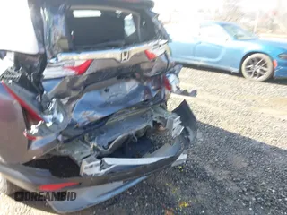 2018 Honda CR-V LX z VIN 2HKRW6H34JH202657, wystawiony jako IAAI lot #41568088 z przebiegiem Nie podano mil oraz . Historia ofert i sprzedaży dostępna na DreamBid. Obrazek 6.