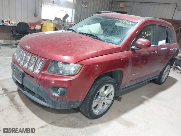 2014 Jeep Compass Latitude with VIN 1C4NJCEB9ED717575, listed as a IAAI auction lot 41532566 with 128,821 mi miles. Bid and sale history available at carsss.com. Image 2.