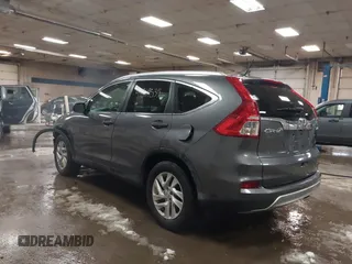 2015 Honda CR-V EX-L with VIN 2HKRM4H75FH604059, listed as a IAAI auction lot 41869535 with 131,848 mi miles. Bid and sale history available at carsss.com. Image 3.
