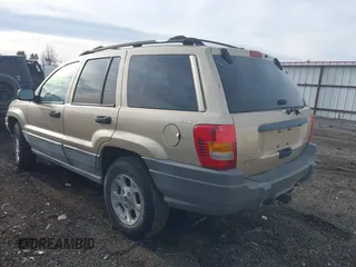 2000 Jeep Grand Cherokee Laredo with VIN 1J4GW48S4YC256978, listed as a IAAI auction lot 40652709 with 117,859 mi miles and . Bid and sale history available at DreamBid. Image 3.