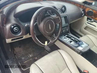 2013 Jaguar XJ with VIN SAJWA1C70D8V41578, listed as a Copart auction lot 89080585 with 76,063 mi miles and Salvage Title. Bid and sale history available at DreamBid. Image 8.