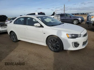 2016 Mitsubishi Lancer SE with VIN JA32V2FW4GU601852, listed as a Copart auction lot 80266414 with 205,708 mi miles and Salvage Title. Bid and sale history available at DreamBid. Image 4.