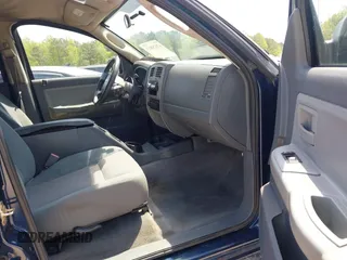 2005 Dodge Dakota SLT with VIN 1D7HW48N05S113487, listed as a IAAI auction lot 42029813 with 229,025 mi miles. Bid and sale history available at carsss.com. Image 5.