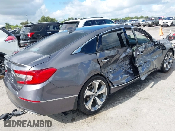 2020 Honda Accord Touring z VIN 1HGCV2F93LA023062, wystawiony jako IAAI lot #42596772 z przebiegiem 53 586 mil mil oraz . Historia ofert i sprzedaży dostępna na DreamBid. Obrazek 4.