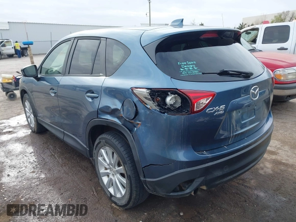 2014 Mazda CX-5 Grand Touring with VIN JM3KE4DYXE0403192, listed as a IAAI auction lot 41828016 with 156,270 mi miles and . Bid and sale history available at carsss.com. Image 3.
