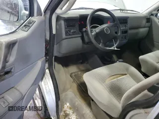 2003 Volkswagen EuroVan MV с VIN WV2NB47073H001005, выставлен на аукционе Copart как лот 87284844 с пробегом 283 979 миль миль и Чистый • Clean title. История ставок и продаж доступна на DreamBid. Изображение 8.