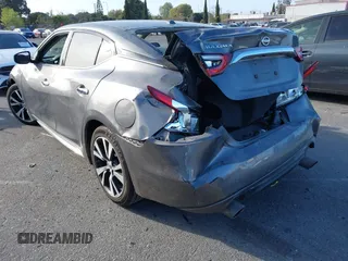 2017 Nissan Maxima SV with VIN 1N4AA6AP7HC387081, listed as a IAAI auction lot 41710501 with 144,538 mi miles. Bid and sale history available at carsss.com. Image 3.