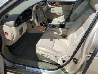 2004 Jaguar XJ with VIN SAJWA71C24SG28164, listed as a Copart auction lot 73968134 with 0 mi miles and Salvage Title. Bid and sale history available at carsss.com. Image 7.