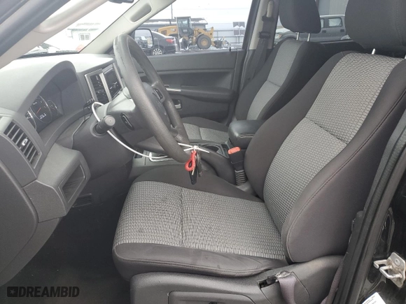 2010 Jeep Grand Cherokee Laredo with VIN 1J4RR4GT2AC107520, listed as a Copart auction lot 86554664 with 141,517 mi miles and Salvage Title. Bid and sale history available at carsss.com. Image 7.