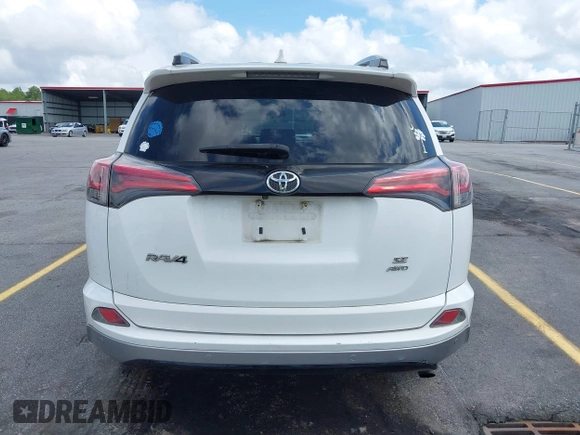 2017 Toyota RAV4 SE with VIN 2T3JFREV7HW637809, listed as a IAAI auction lot 42472464 with 173,273 mi miles and . Bid and sale history available at DreamBid. Image 16.