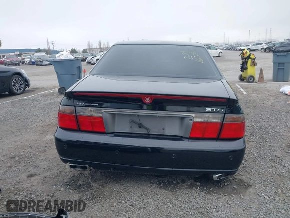 2002 Cadillac Seville Touring STS z VIN 1G6KY54982U239673, wystawiony jako IAAI lot #41657709 z przebiegiem 92 224 mil mil oraz . Historia ofert i sprzedaży dostępna na DreamBid. Obrazek 17.