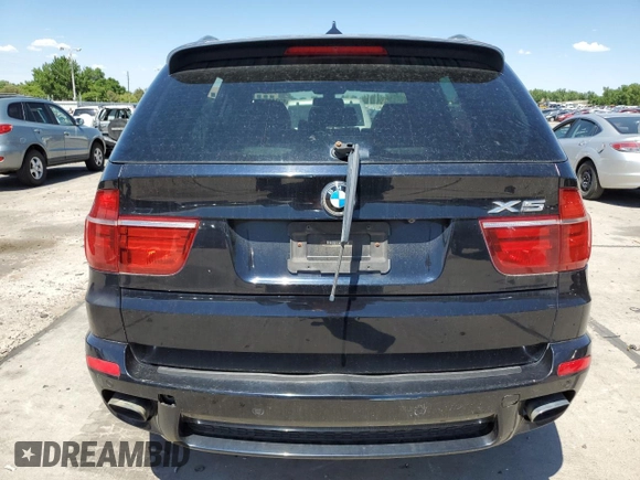 2012 BMW X5 50i with VIN 5UXZV8C59CL426057, listed as a Copart auction lot 63341775 with 92,822 mi miles and Clean title. Bid and sale history available at DreamBid. Image 6.
