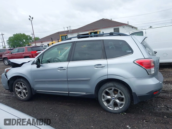 2018 Subaru Forester Touring with VIN JF2SJAWC6JH496875, listed as a IAAI auction lot 42347532 with 70,978 mi miles and . Bid and sale history available at DreamBid. Image 14.