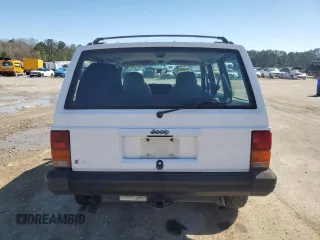 1995 Jeep Cherokee Sport with VIN 1J4FJ68S0SL646747, listed as a Copart auction lot 48772675 with 239,834 mi miles and Salvage title. Bid and sale history available at DreamBid. Image 6.