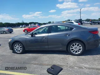 2016 Mazda Mazda6 i Sport with VIN JM1GJ1U5XG1482164, listed as a IAAI auction lot 42052618 with 79,630 mi miles. Bid and sale history available at carsss.com. Image 14.