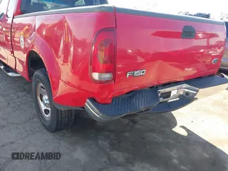 2002 Ford F-150 XL with VIN 1FTRX17W52NA81828, listed as a IAAI auction lot 41450811 with 201,948 mi miles. Bid and sale history available at carsss.com. Image 6.