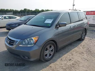 2008 Honda Odyssey Touring z VIN 5FNRL38978B047803, wystawiony jako IAAI lot #42427855 z przebiegiem 125 697 mil mil oraz . Historia ofert i sprzedaży dostępna na DreamBid. Obrazek 2.