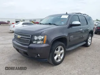 2011 Chevrolet Tahoe LT with VIN 1GNSCBE09BR284481, listed as a IAAI auction lot 42051462 with 194,670 mi miles and . Bid and sale history available at DreamBid. Image 2.