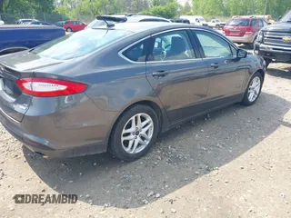 2015 Ford Fusion SE z VIN 3FA6P0HD0FR220864, wystawiony jako IAAI lot #42422266 z przebiegiem 148 361 mil mil oraz . Historia ofert i sprzedaży dostępna na DreamBid. Obrazek 4.