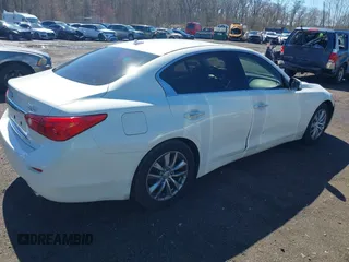 2014 Infiniti Q50 Sport with VIN JN1BV7AP7EM679296, listed as a IAAI auction lot 41834654 with 126,337 mi miles and . Bid and sale history available at DreamBid. Image 4.