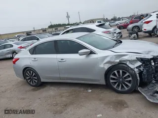 2017 Nissan Altima 2.5 SR with VIN 1N4AL3AP6HC293878, listed as a IAAI auction lot 41582060 with 154,542 mi miles. Bid and sale history available at carsss.com. Image 13.