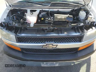 2013 Chevrolet Express Passenger 1LT z VIN 1GAZGYFG7D1130758, wystawiony jako Copart lot #59625915 z przebiegiem 152 806 mil mil oraz Szkoda całkowita • Salvage title. Historia ofert i sprzedaży dostępna na DreamBid. Obrazek 12.