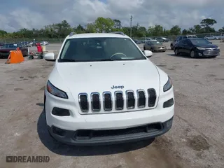2015 Jeep Cherokee Latitude with VIN 1C4PJMCB4FW595084, listed as a IAAI auction lot 41880572 with 146,750 mi miles. Bid and sale history available at carsss.com. Image 12.