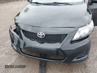 2010 Toyota Corolla with VIN 1NXBU4EE8AZ325526, listed as a IAAI auction lot 42027713 with 122,524 mi miles. Bid and sale history available at carsss.com. Image 6.