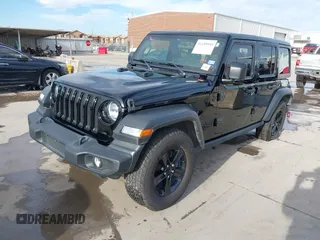 2021 Jeep Wrangler Unlimited Sport S with VIN 1C4HJXDN0MW817146, listed as a IAAI auction lot 41459993 with 20,367 mi miles and . Bid and sale history available at DreamBid. Image 2.