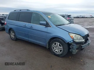 2007 Honda Odyssey EX-L z VIN 5FNRL38647B139018, wystawiony jako IAAI lot #41712602 z przebiegiem 243 473 mil mil oraz . Historia ofert i sprzedaży dostępna na DreamBid. Obrazek 1.