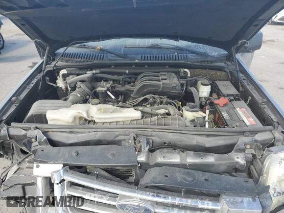 2009 Ford Explorer Sport Trac XLT z VIN 1FMEU31EX9UA10347, wystawiony jako Copart lot #75545664 z przebiegiem Nie podano mil oraz Szkoda całkowita • Salvage title. Historia ofert i sprzedaży dostępna na DreamBid. Obrazek 11.