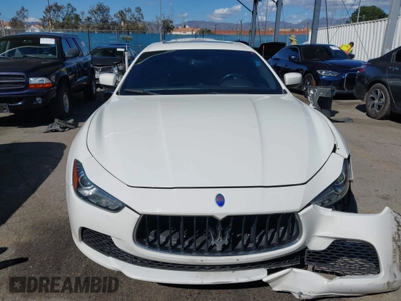 2015 Maserati Ghibli z VIN ZAM57XSA8F1161212, wystawiony jako IAAI lot #41746084 z przebiegiem 57 169 mil mil oraz . Historia ofert i sprzedaży dostępna na DreamBid. Obrazek 12.