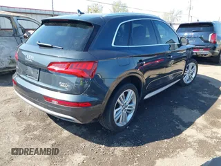 2018 Audi Q5 Premium Plus z VIN WA1BNAFY7J2149356, wystawiony jako IAAI lot #41851706 z przebiegiem 134 874 mil mil oraz . Historia ofert i sprzedaży dostępna na DreamBid. Obrazek 4.