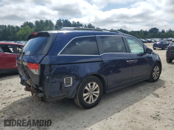 2014 Honda Odyssey EX-L with VIN 5FNRL5H61EB114764, listed as a Copart auction lot 61189305 with 167,185 mi miles and Clean title. Bid and sale history available at DreamBid. Image 3.