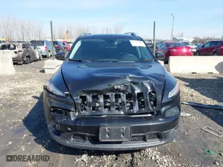 2015 Jeep Cherokee Latitude with VIN 1C4PJMCS9FW577440, listed as a IAAI auction lot 41707489 with 159,838 mi miles. Bid and sale history available at carsss.com. Image 6.