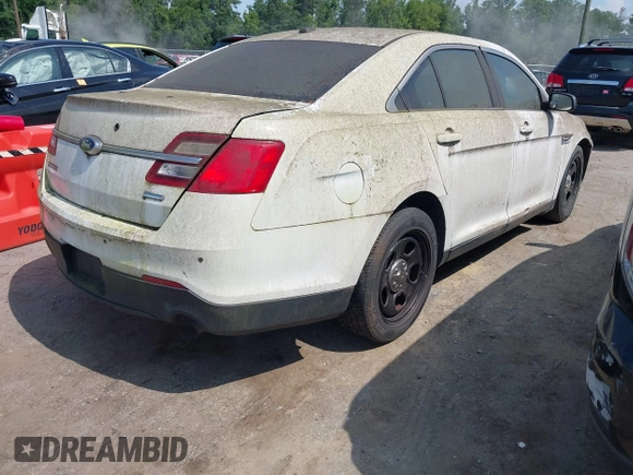 2013 Ford Police Interceptor with VIN 1FAHP2M80DG205024, listed as a IAAI auction lot 42740282 with 123,705 mi miles and . Bid and sale history available at DreamBid. Image 4.