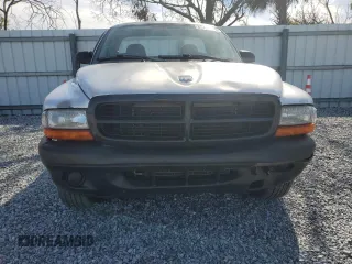 2003 Dodge Dakota with VIN 1D7FL16X23S122093, listed as a Copart auction lot 87394974 with 264,510 mi miles and Salvage Title. Bid and sale history available at carsss.com. Image 5.